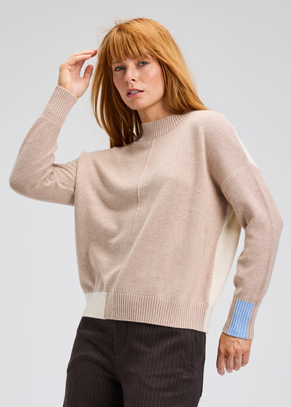 Oat color block trim sweater with mock neck and striped blue cuff detail