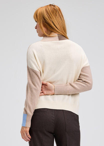 Oat color block trim sweater, back view with striped sleeves and ribbed hem