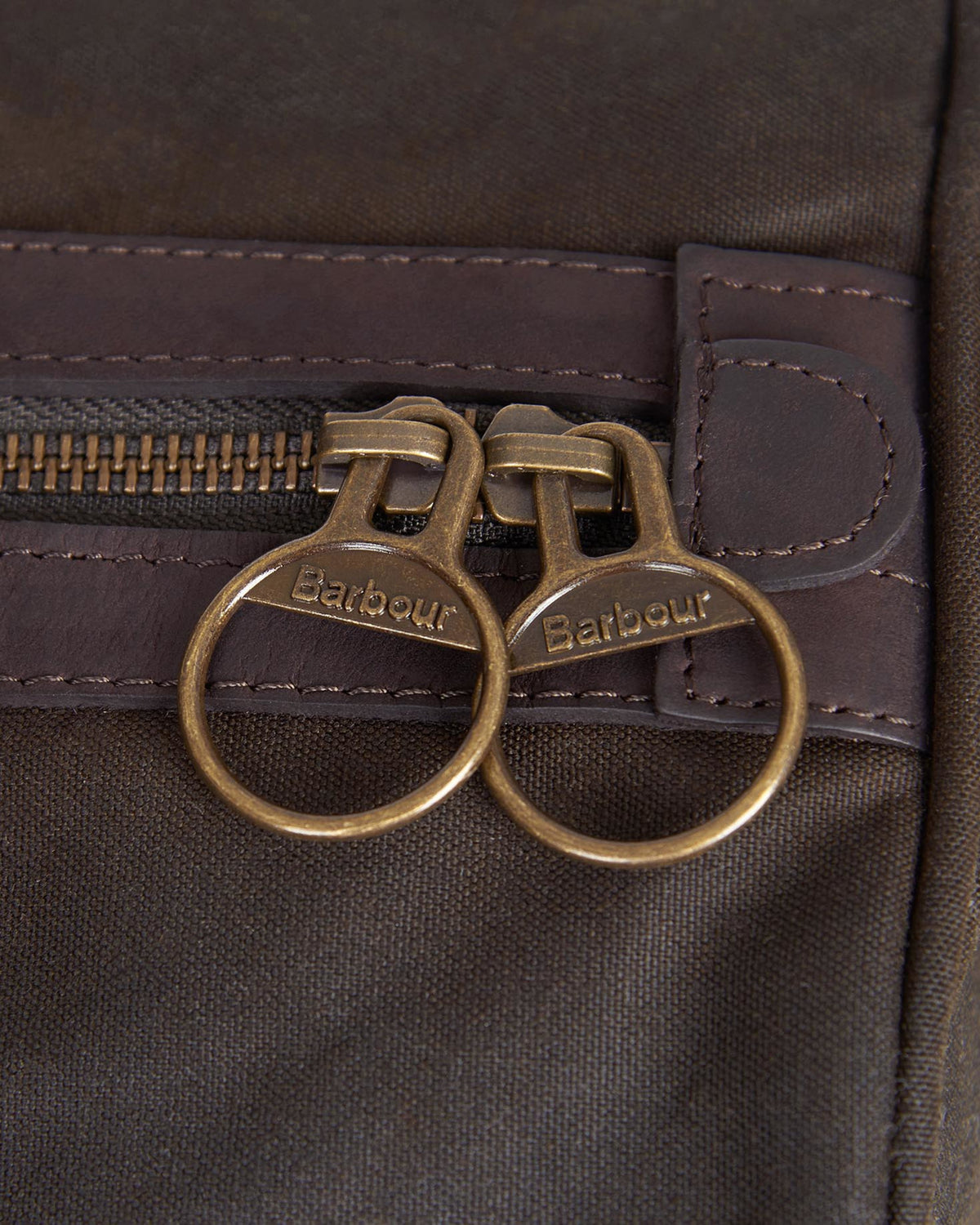 Wax Holdall zipper pulls in antique brass with Barbour branding on brown waxed cotton, Bags collection