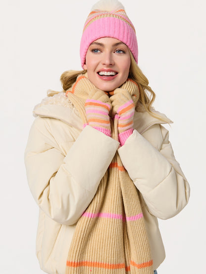 Woman wearing Elle Scarf striped in beige with pink and orange, styled with knit hat and gloves