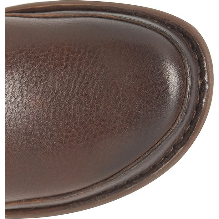 Brown leather boot upper close-up with stitched edge trim