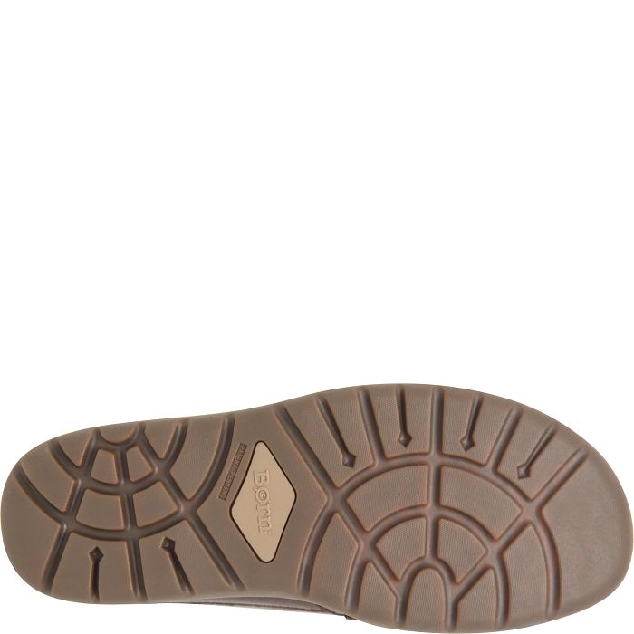 Rubber outsole tread with grid pattern and embossed logo at center