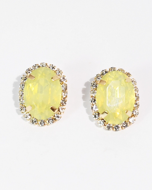 The Golden Glow Studs with luminous yellow oval gemstones and crystal accents by TREASURE JEWELS