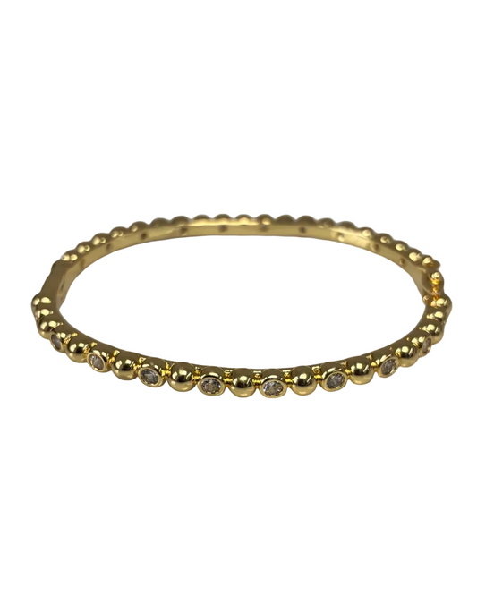 Bezel CZ Bangle in gold plating with sparkling cubic zirconia, personally curated in Fredericksburg TX