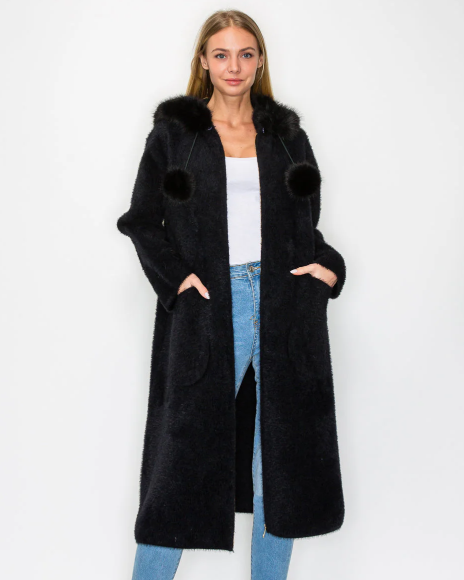 Suraya Knitted Brushed Coat in black with faux fur hood and pom-poms by JOH APPAREL