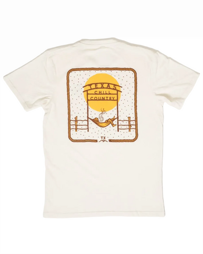 Chill Country Ranch Tee featuring a relaxed design with a hammock, sunset, and Texas Hill Country theme in warm tones, embodying effortless Hill Country style.