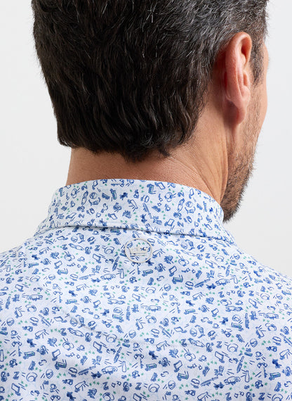 Wilkins Performance Jersey Polo in white floral blue with moisture wicking and UV protection