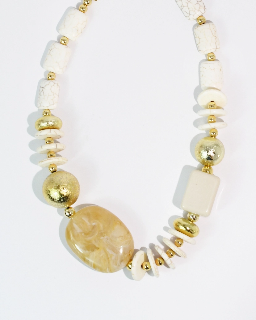 Golden Sand Necklace with neutral white beads and textured golden accents, curated in Fredericksburg TX