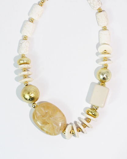 Golden Sand Necklace with neutral white beads and textured golden accents, curated in Fredericksburg TX
