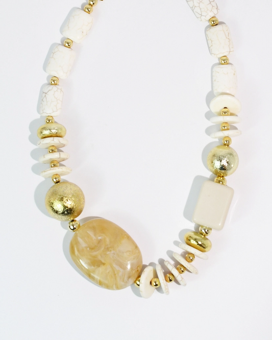 Golden Sand Necklace with neutral white beads and textured golden accents, curated in Fredericksburg TX