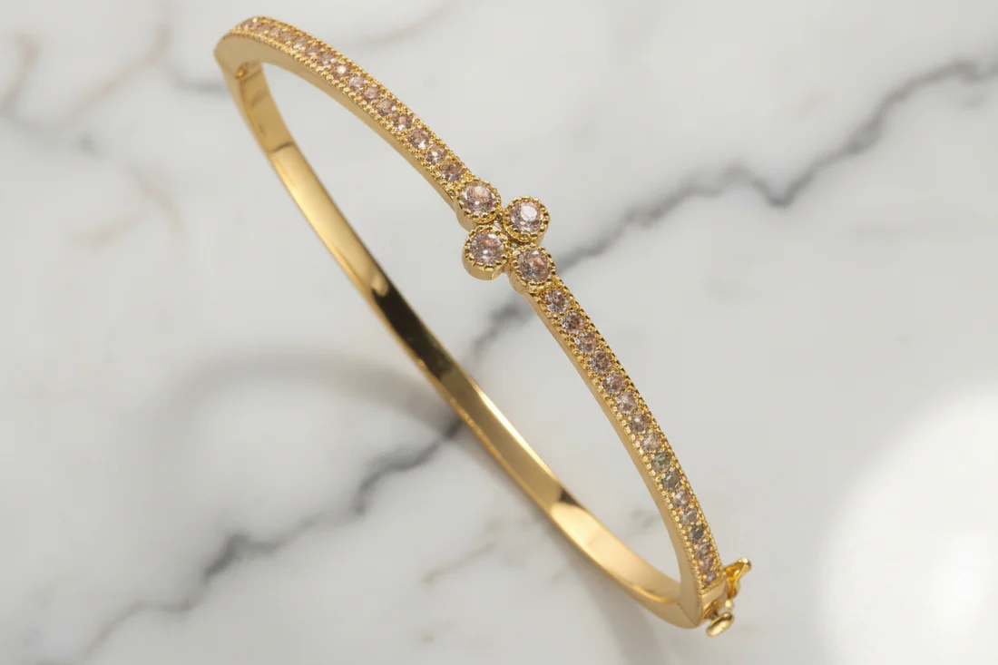 Thin CZ Bangle w/CZ Flower - Gold plated surgical steel, Women's Jewelry HCO by FOSSICK IMPORTS