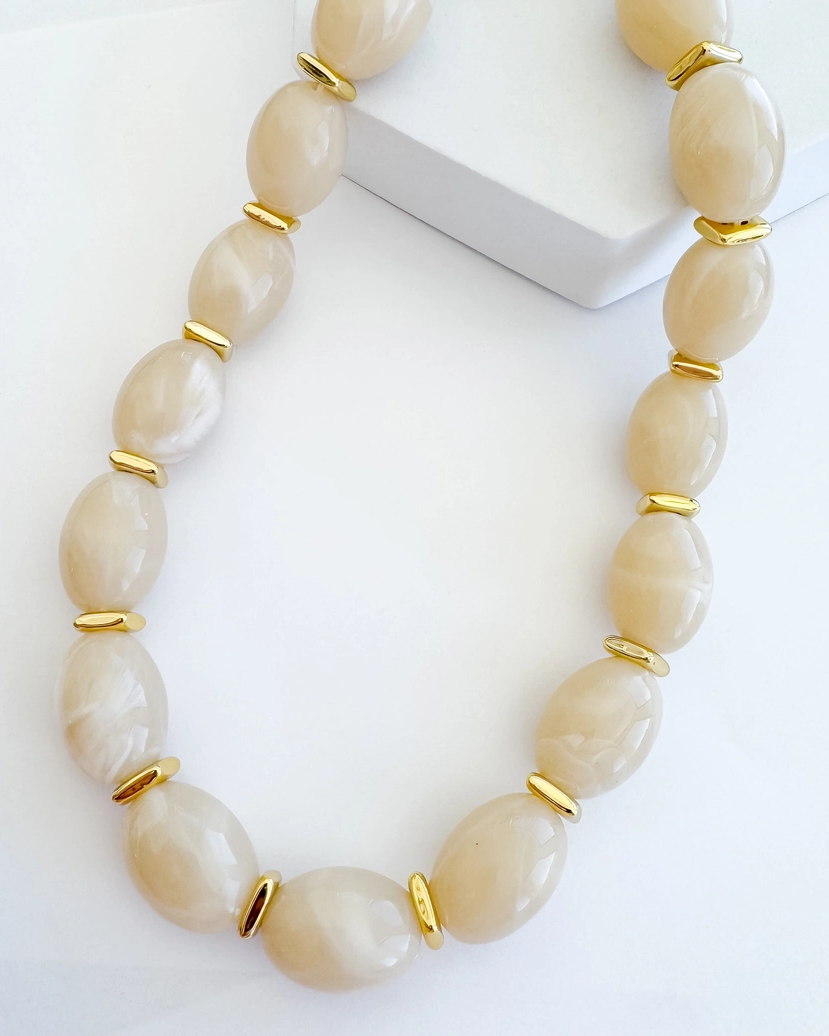 Jelly Pop cream necklace with smooth ivory beads and gold spacers, personally curated in Fredericksburg TX
