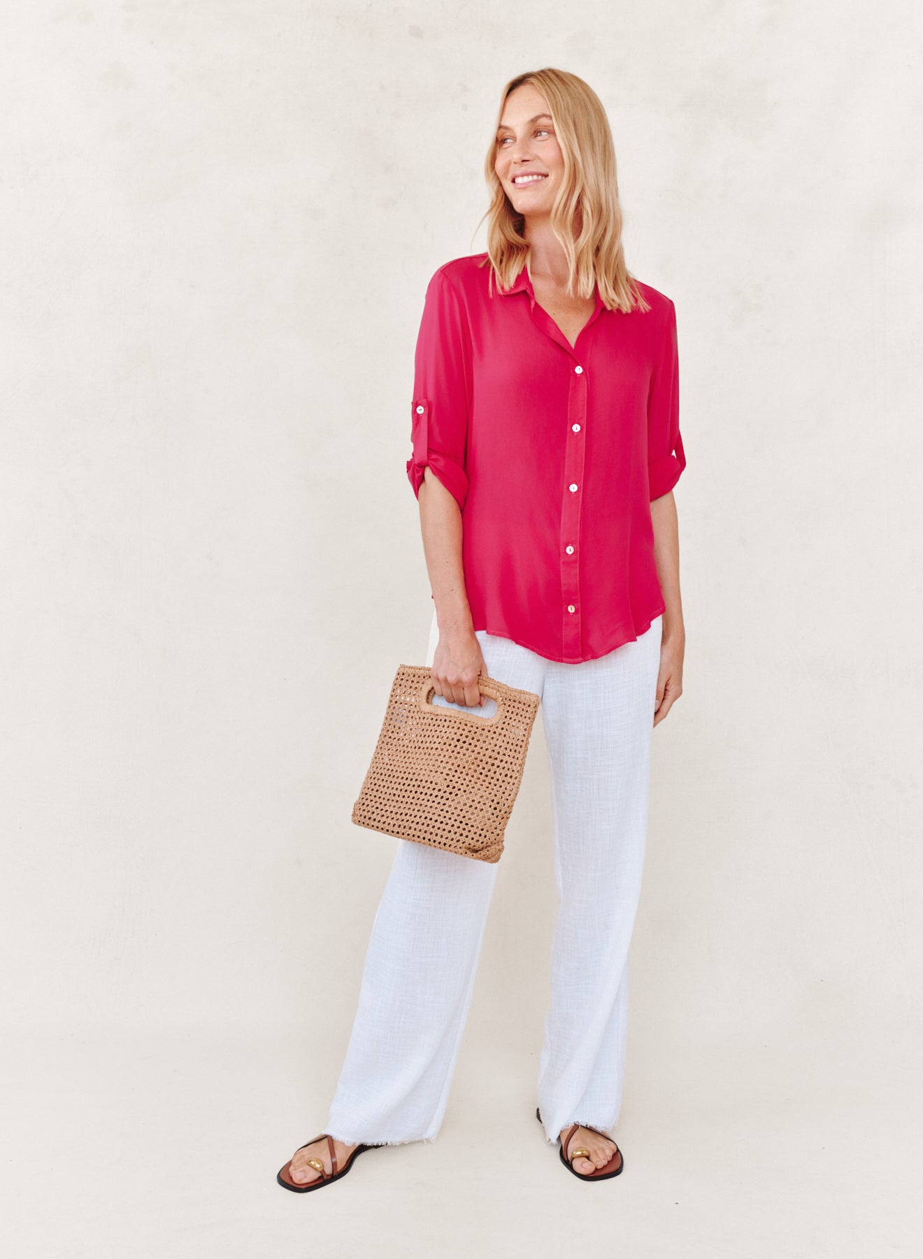 CLEAN SHIRT WITH ROLL SLEEVE in vibrant red rayon, styled casually with white pants, Fredericksburg boutique