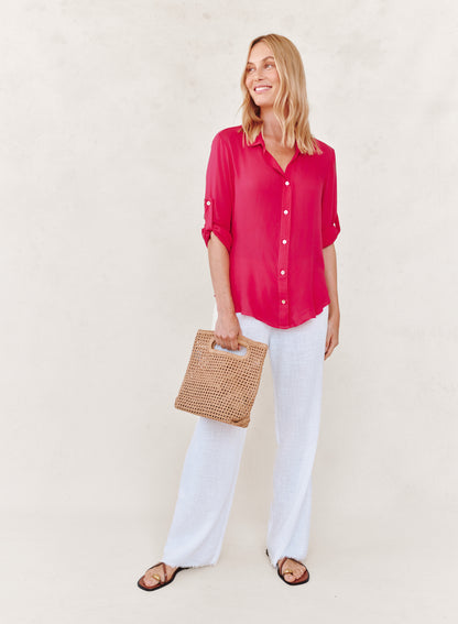 CLEAN SHIRT WITH ROLL SLEEVE in vibrant red rayon, styled casually with white pants, Fredericksburg boutique