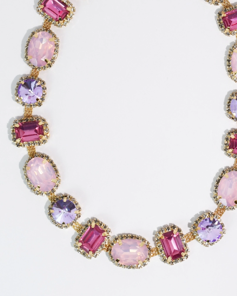 The Rosalie Gem Necklace with blush pink and lavender stones framed in delicate gold detailing