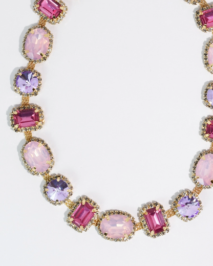 The Rosalie Gem Necklace with blush pink and lavender stones framed in delicate gold detailing