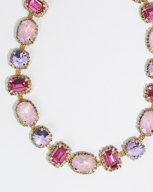 The Rosalie Gem Necklace with blush pink and lavender stones framed in delicate gold detailing