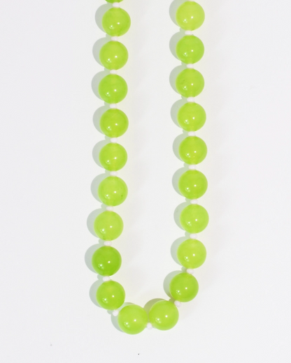 Love Big Necklace with vibrant green gemstone-inspired beads by TREASURE JEWELS, curated Fredericksburg TX