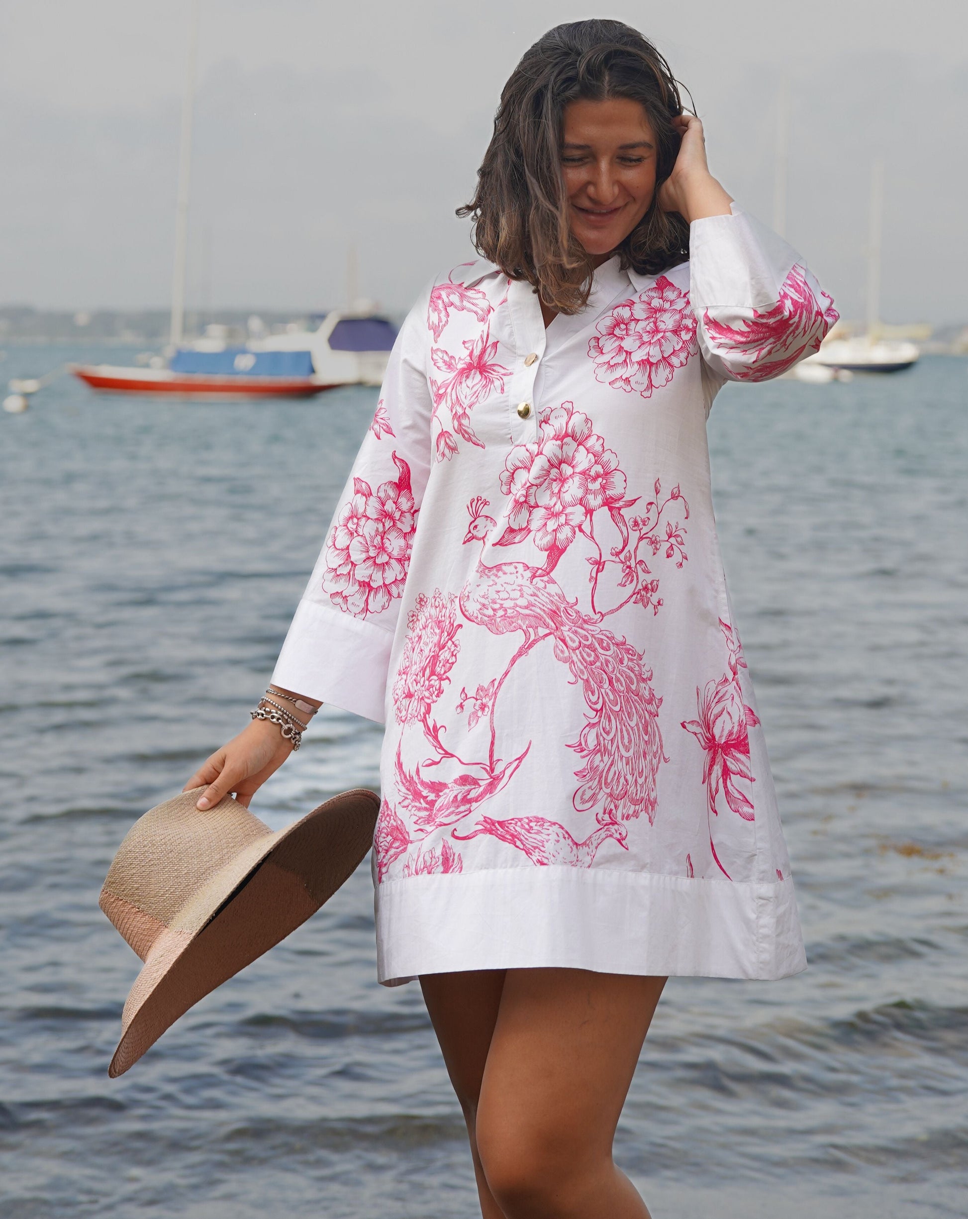 Oceancliff Dress - Peacock in white cotton with pink floral and peacock print by LA PLAGE CABANA
