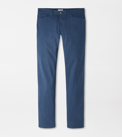 Blue five-pocket pants on a white background