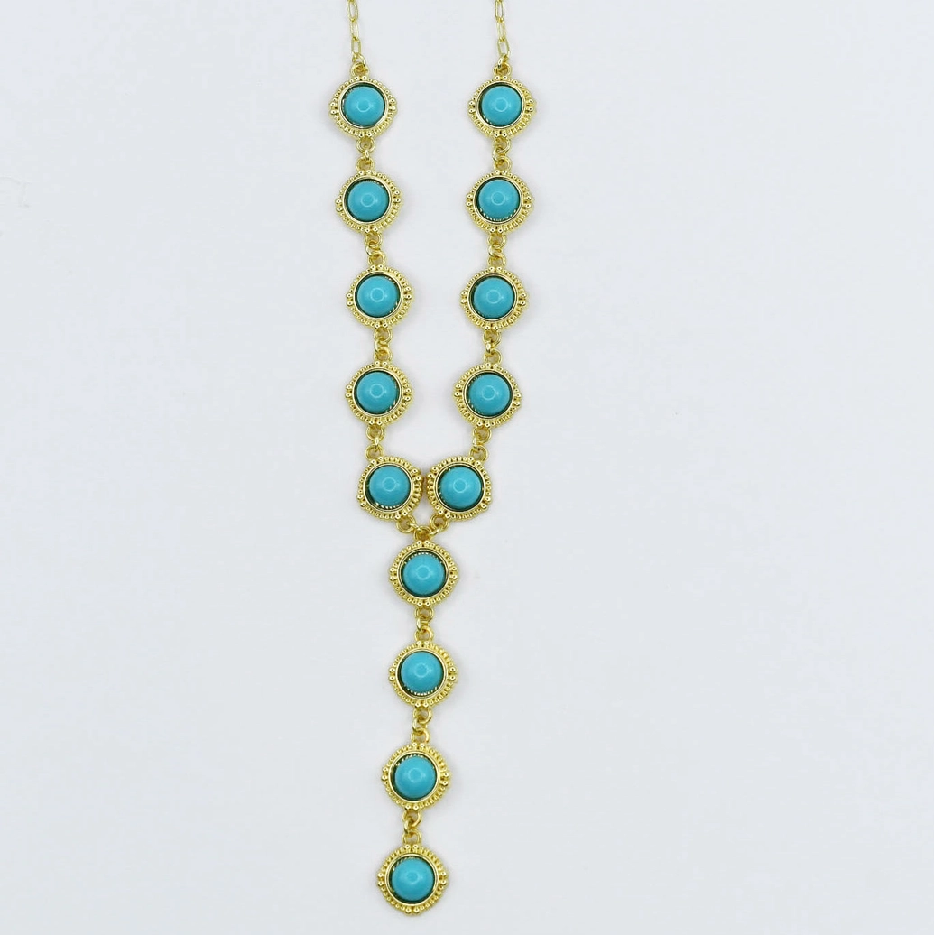 Turquoise Cascade Gold Necklace with turquoise stones in gold settings, artisan-crafted Hill Country style