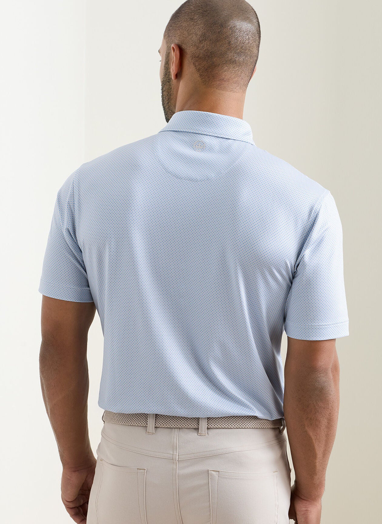 Phoenix Performance Jersey Polo in light blue geometric pattern with moisture wicking by PETER MILLAR