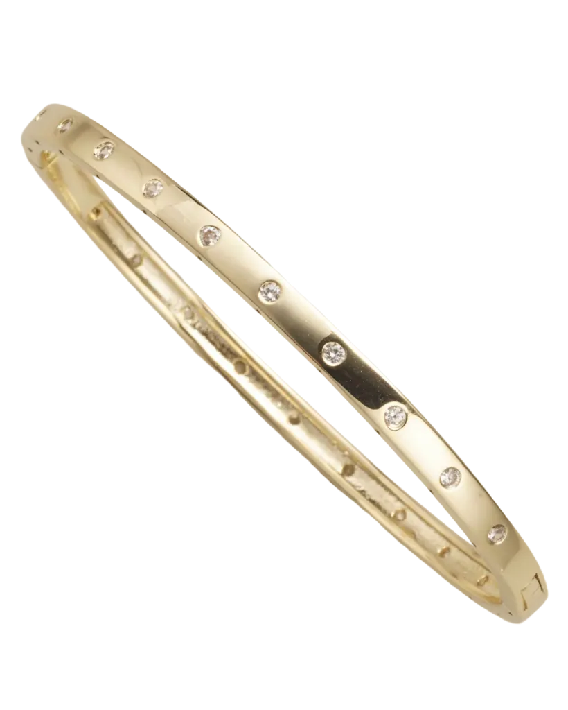 Small Gold Bangle W Tiny Cz featuring a sleek gold finish with small sparkling cubic zirconia accents, perfect for adding understated elegance to any outfit.