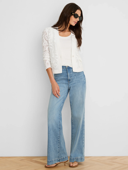 Garden Lace Jacket in white floral lace knit layered over casual white tee styled with wide-leg jeans