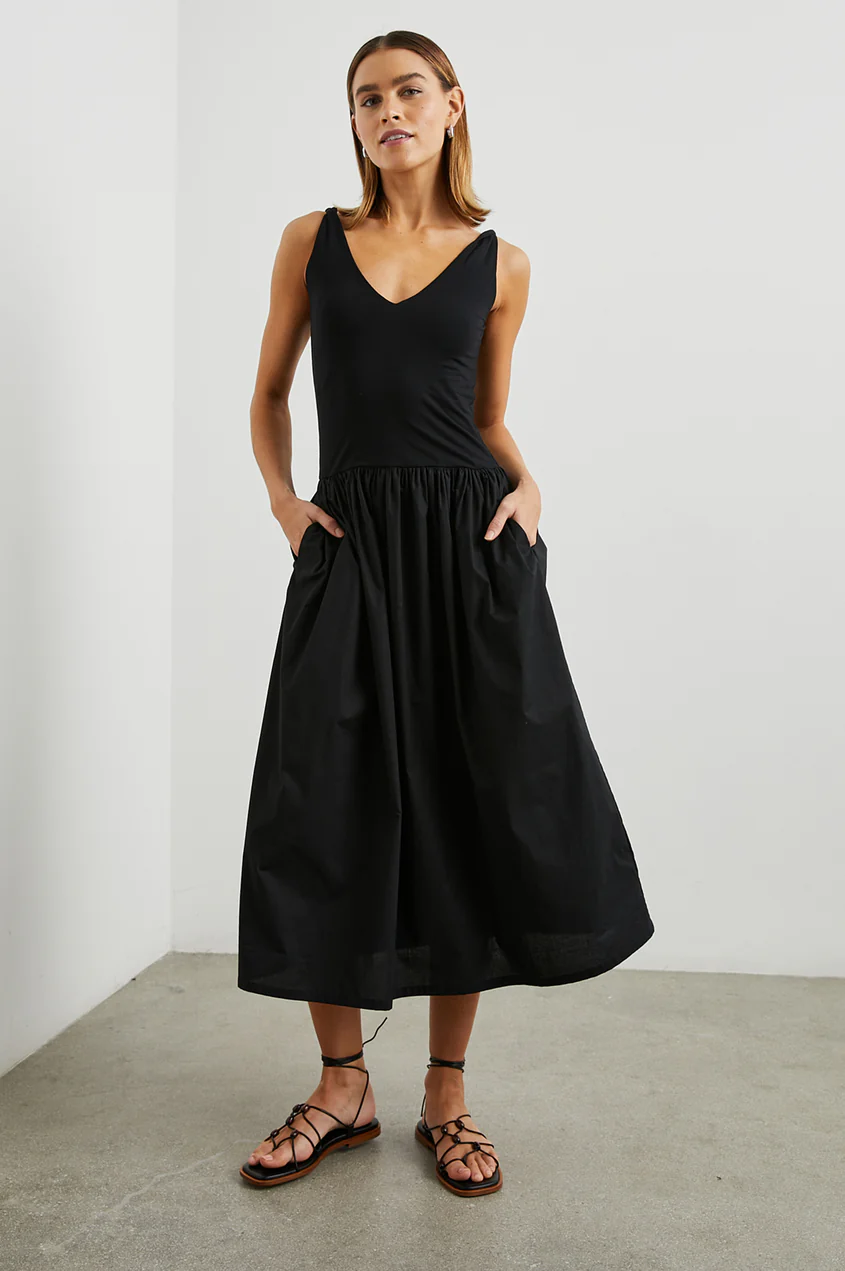 Black sleeveless midi dress with V-neck bodice and gathered full skirt