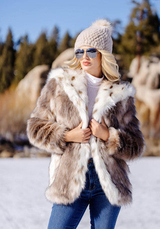 Hooded fur coat in multitone lynx pattern with full hood