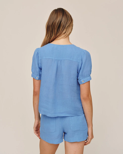 Short Sleeve Flowy Pullover Top in blue linen with buttoned sleeves by BELLA DAHL at HCO Fredericksburg