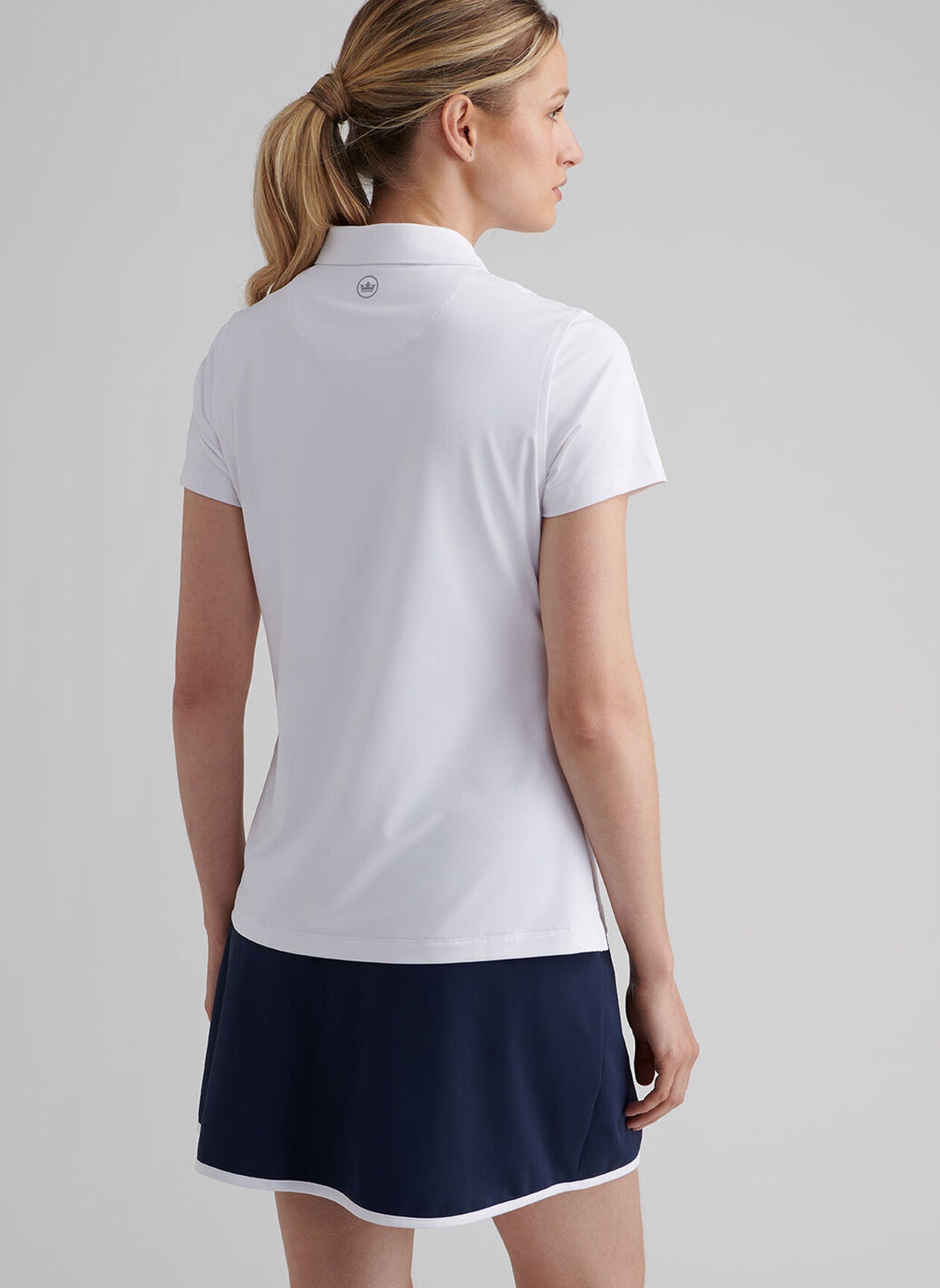 Short-Sleeve Button Polo in white with moisture wicking and UPF 50+ sun protection, Peter Millar