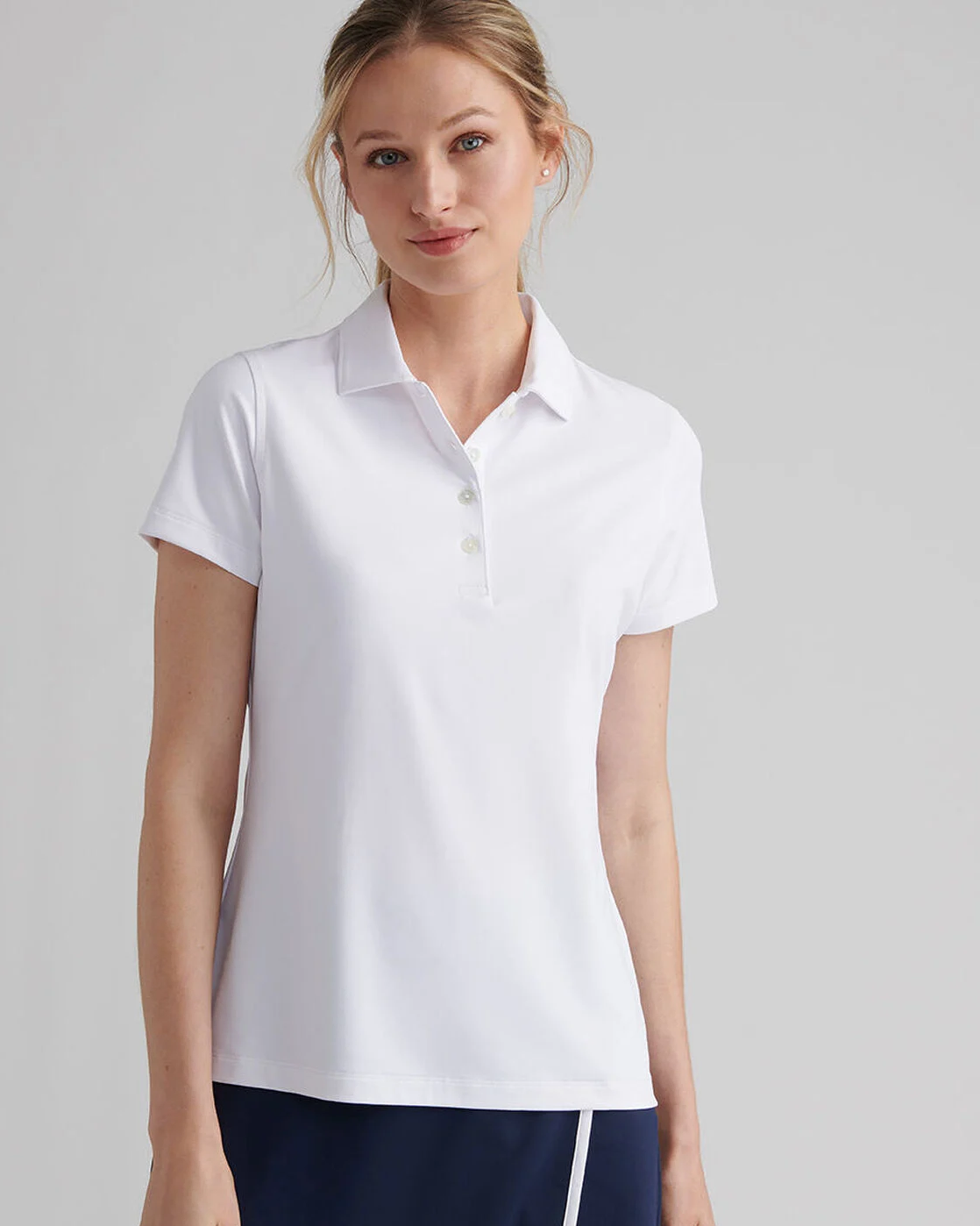 Short-Sleeve Button Polo in white with moisture wicking, UV protection, and quick dry fabric