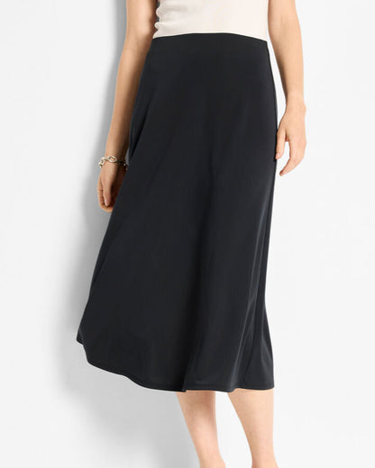Knit Crepe Slip Skirt in black stretch fabric, sleek midi A-line silhouette by NIC AND ZOE
