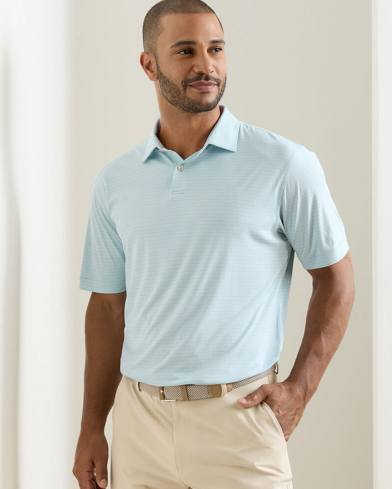 Featherweight Trading Stripe Performance Polo in light blue with moisture wicking and UPF 50+ protection