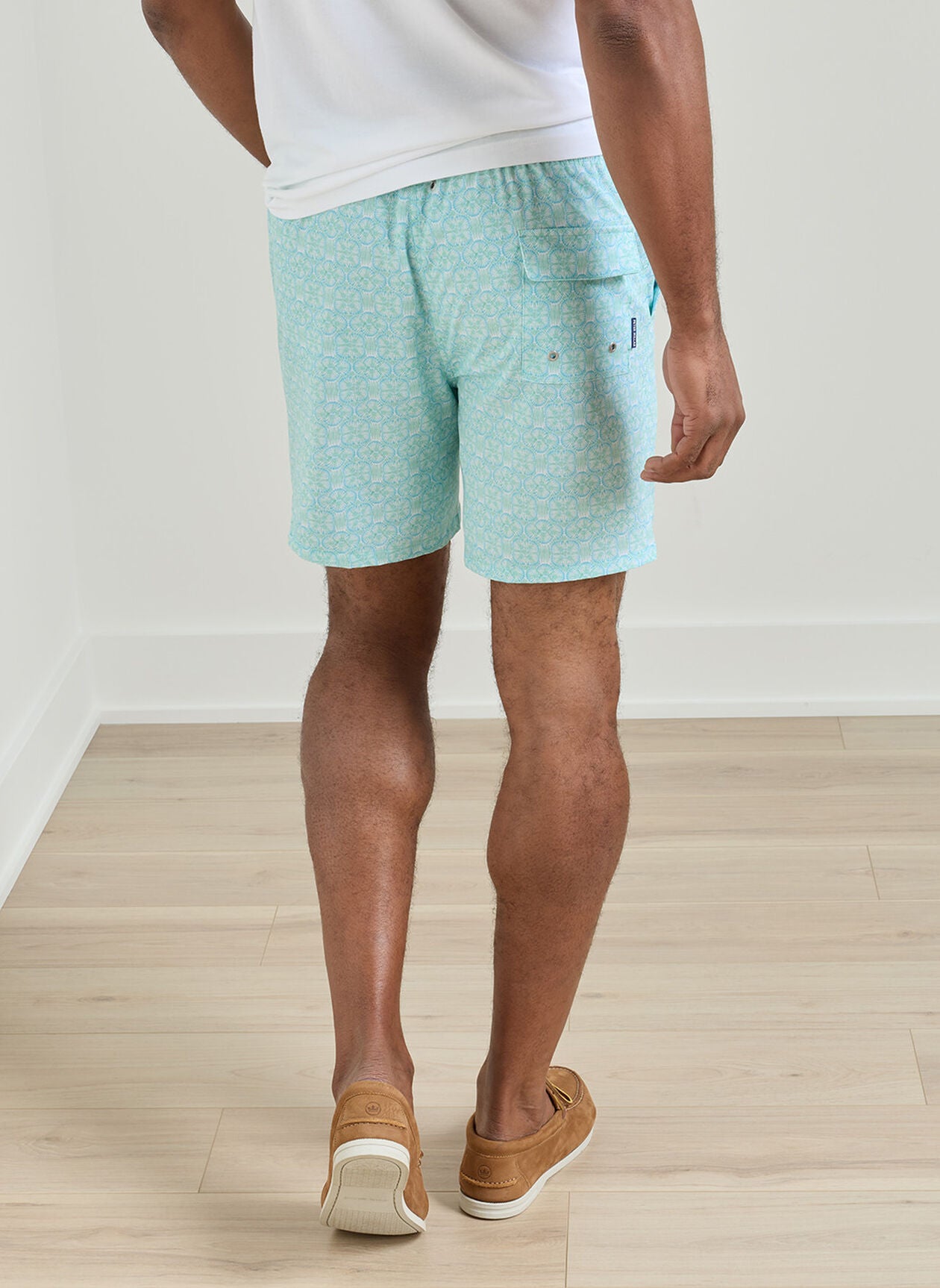 Tide Lines Swim Trunk in blue and green geometric print with quick-dry stretch fabric
