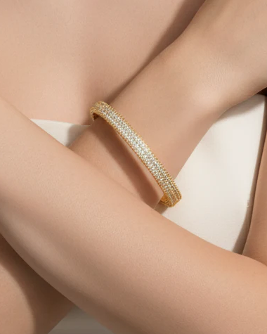 Bangle w/Pave CZ's - Gold on wrist, elegant design in 14K gold plated steel by FOSSICK IMPORTS
