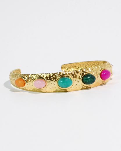 Paraiso Bangle with hammered gold cuff and colorful oval gemstone accents by TREASURE JEWELS