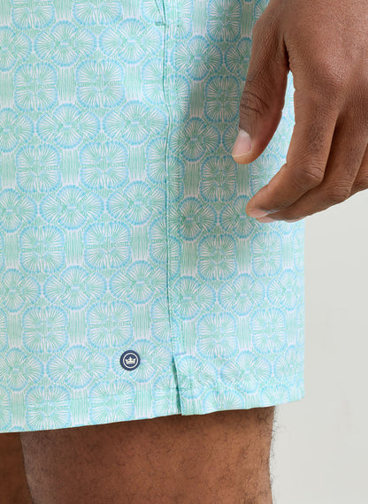 Tide Lines Swim Trunk in light blue and green geometric print with quick-dry stretch fabric