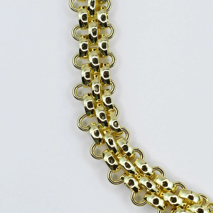 Golden Majesty Collar with interwoven geometric gold links and toggle clasp by TREASURE JEWELS