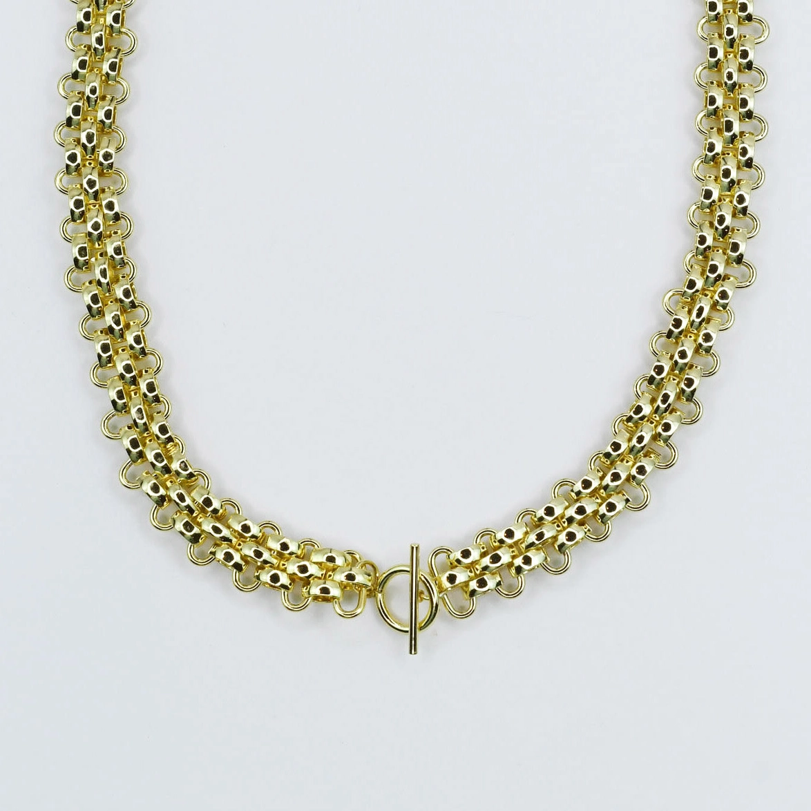Golden Majesty Collar with geometric gold chain and toggle clasp by TREASURE JEWELS, HCO collection