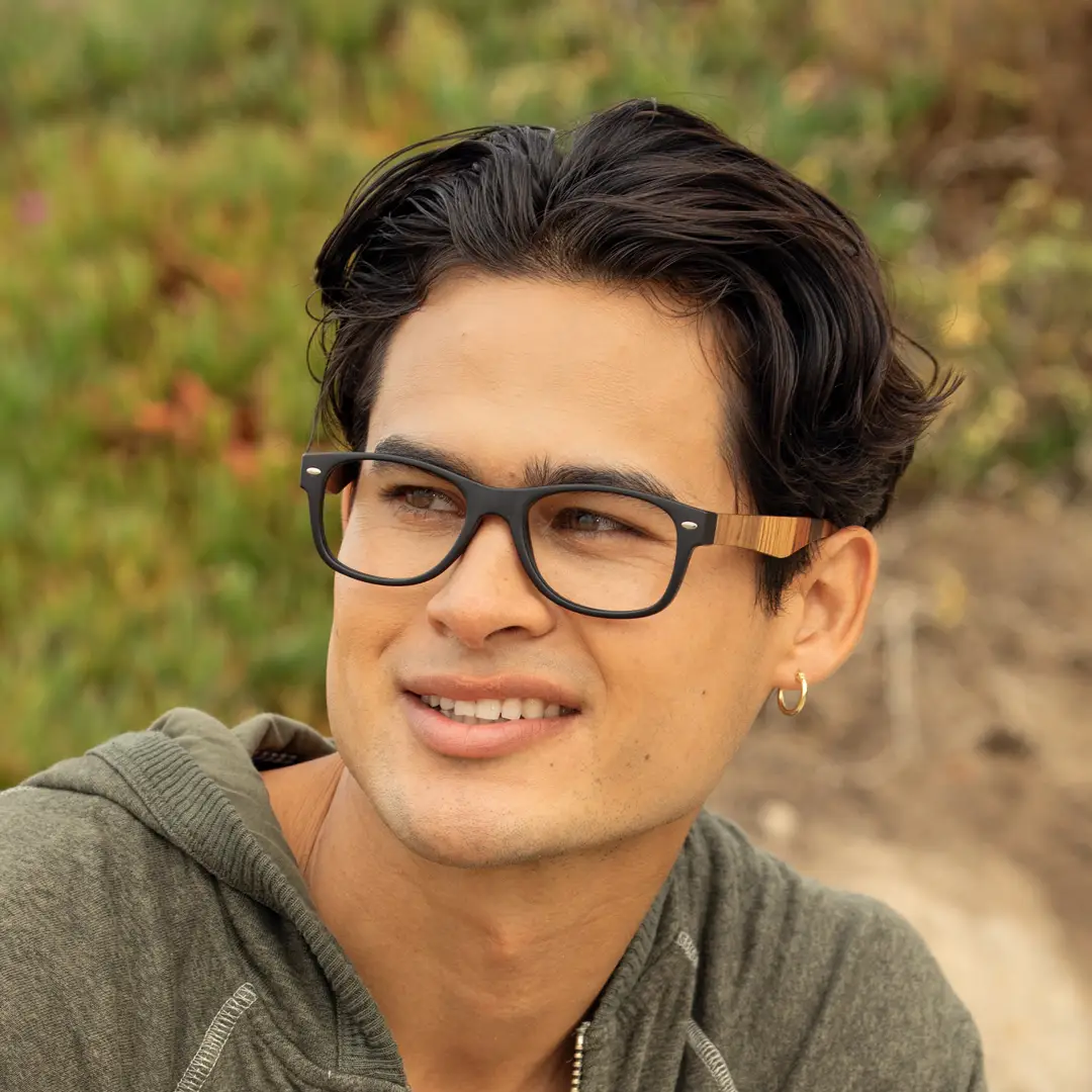 River eyeglasses on face, matte onyx black frame and multi-wood temple