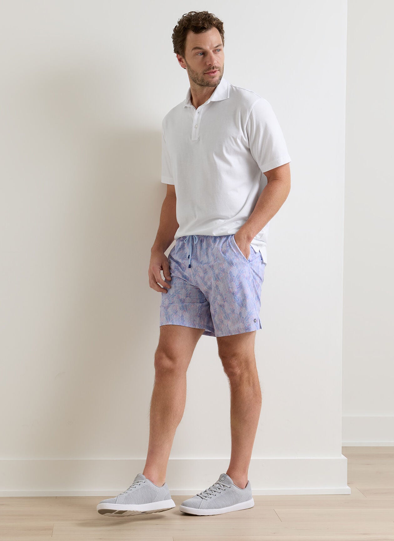Sunset Palms Swim Trunk in blue multicolor geometric print with quick-dry stretch fabric