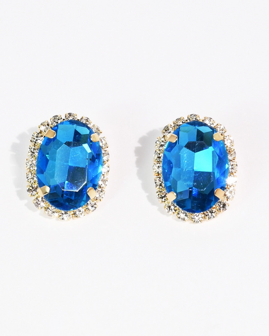 The Santorini Studs with luminous blue oval gemstones and crystal accents by TREASURE JEWELS