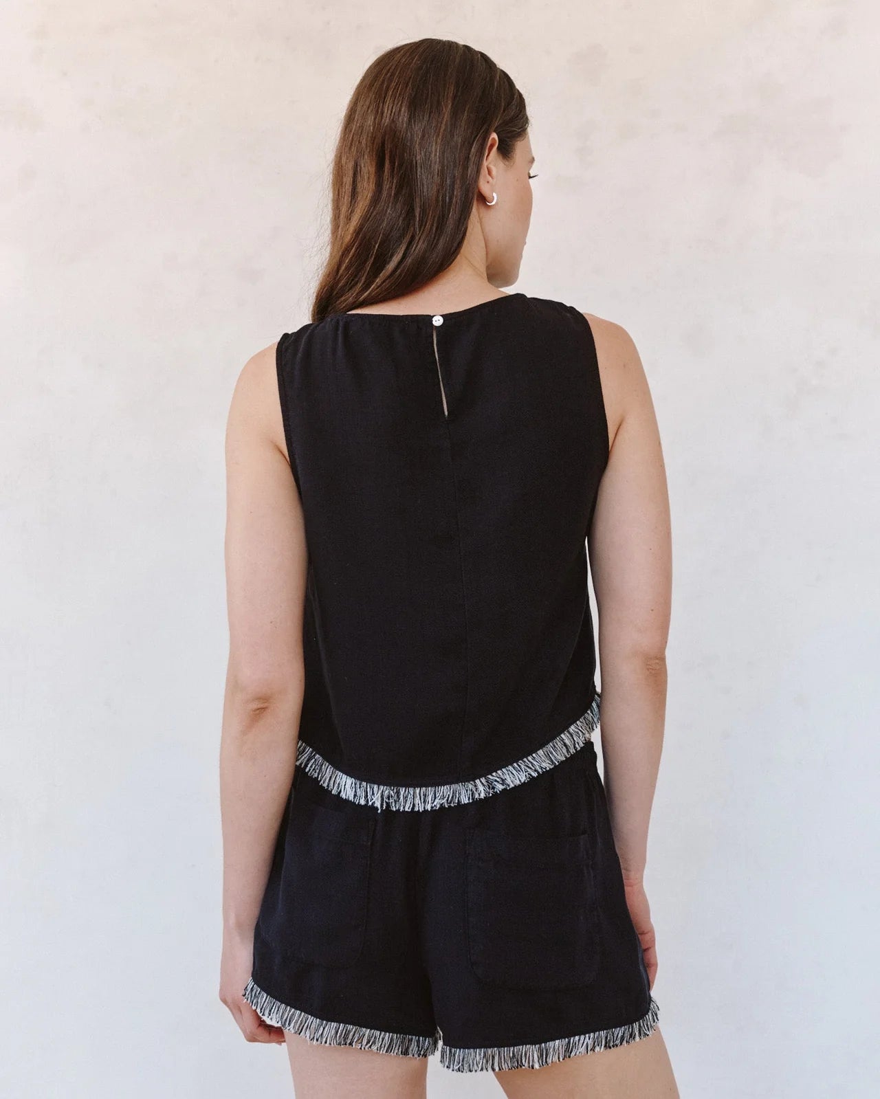 Sleeveless Fray Trim - Black sleeveless crew neck tank with button back by BELLA DAHL
