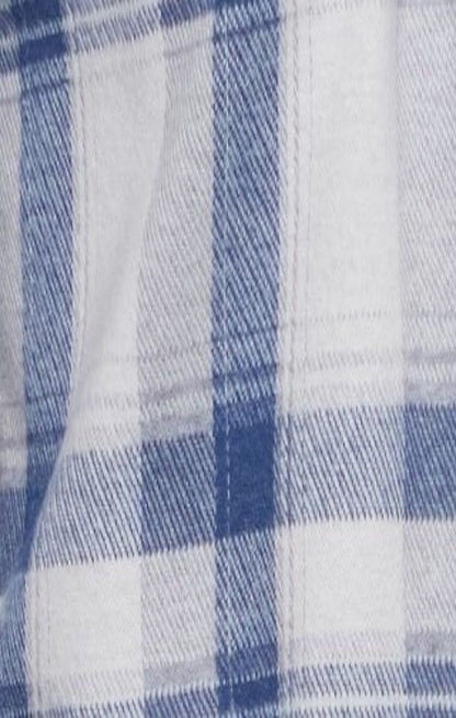 Cream and blue plaid knit flannel fabric close-up
