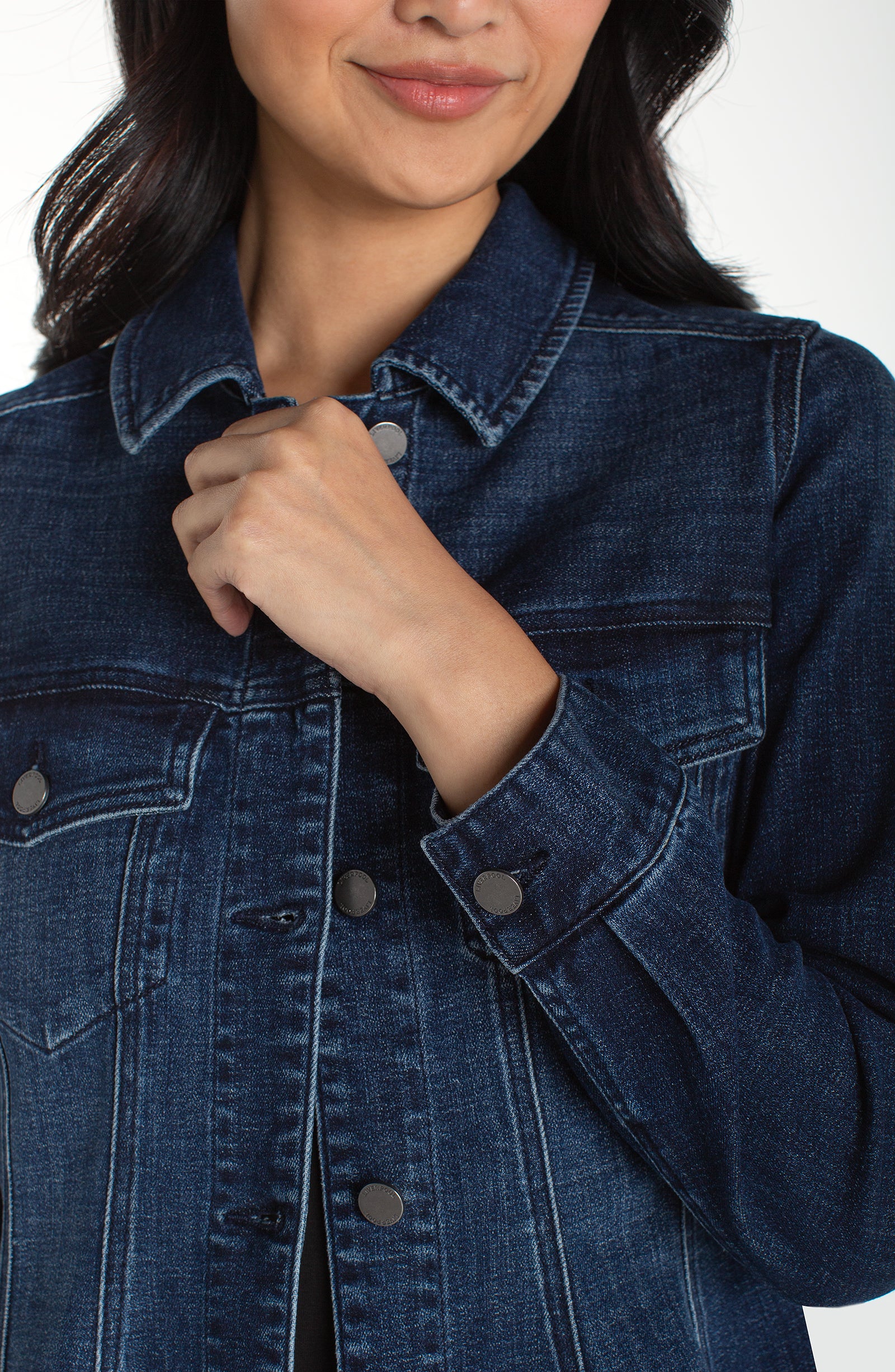 FIT AND FLARE TRUCKER JACKET in blue denim with button front and flap pockets, curated in Texas