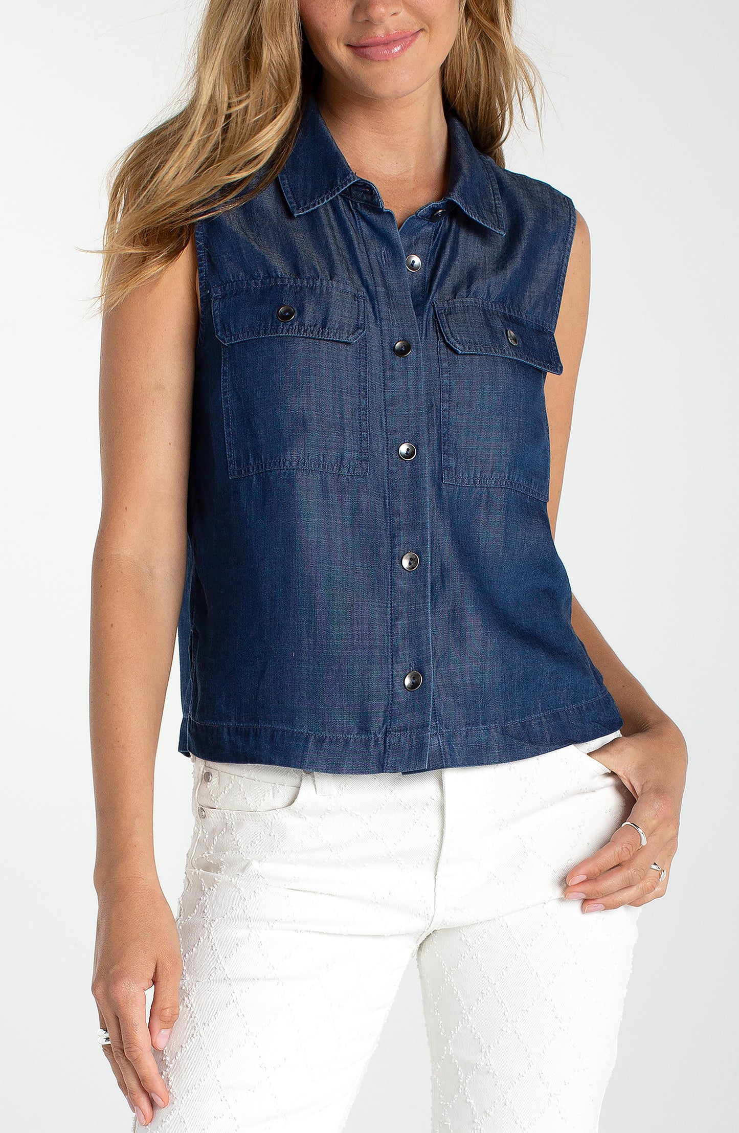 Sleeveless Button Top w/Pockets in blue denim with chest pockets and button front closure